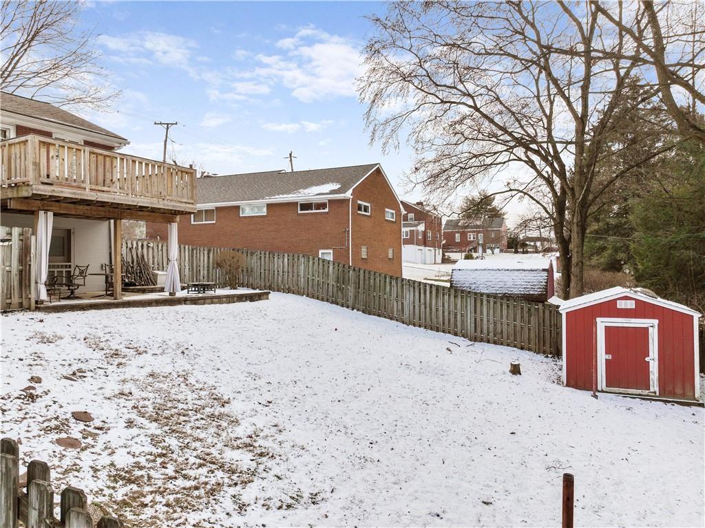 903 Wible Run Road Pittsburgh, PA 15209 - Photo 31 of 33 a street view with wooden fence