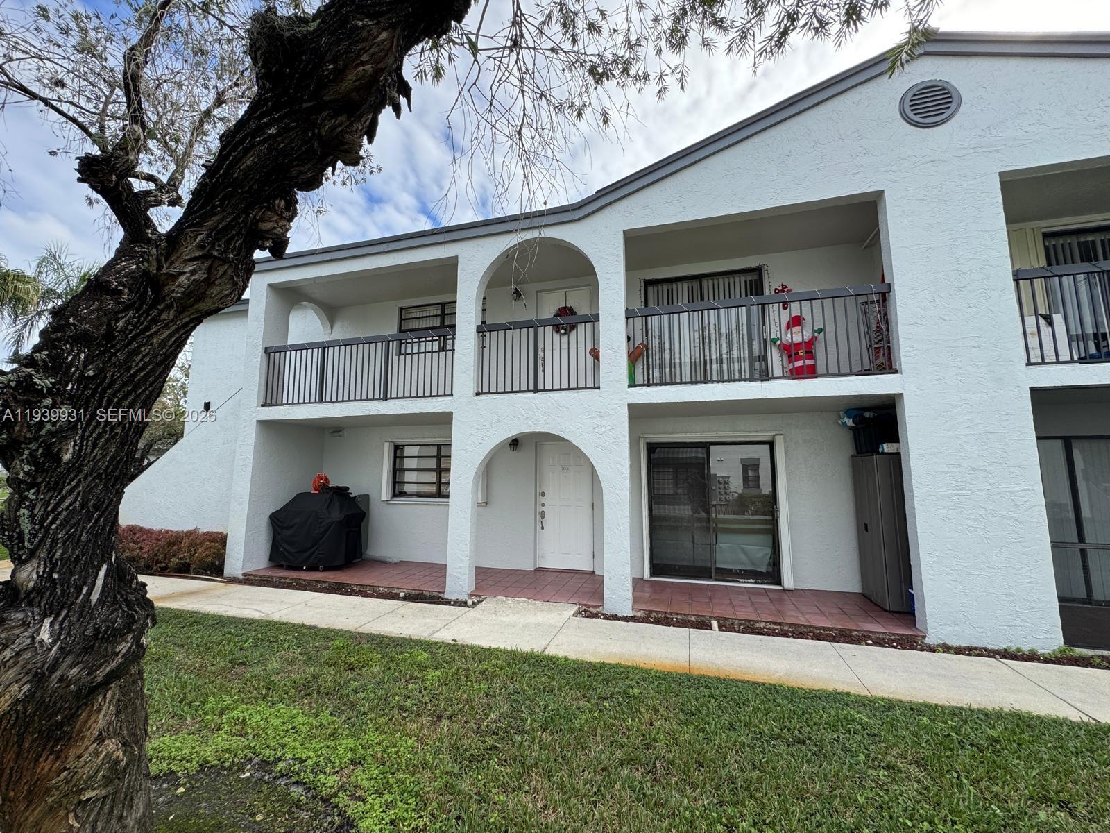 a view of building with yard