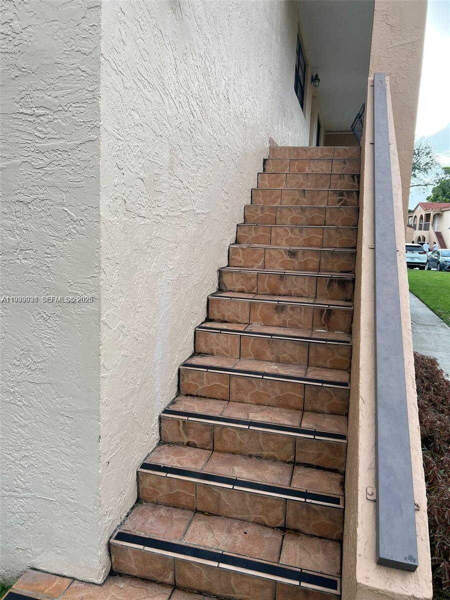 18210 Mediterranean Boulevard, Unit 620 Hialeah, FL 33015 - Photo 22 of 27 a view of entryway with a front door
