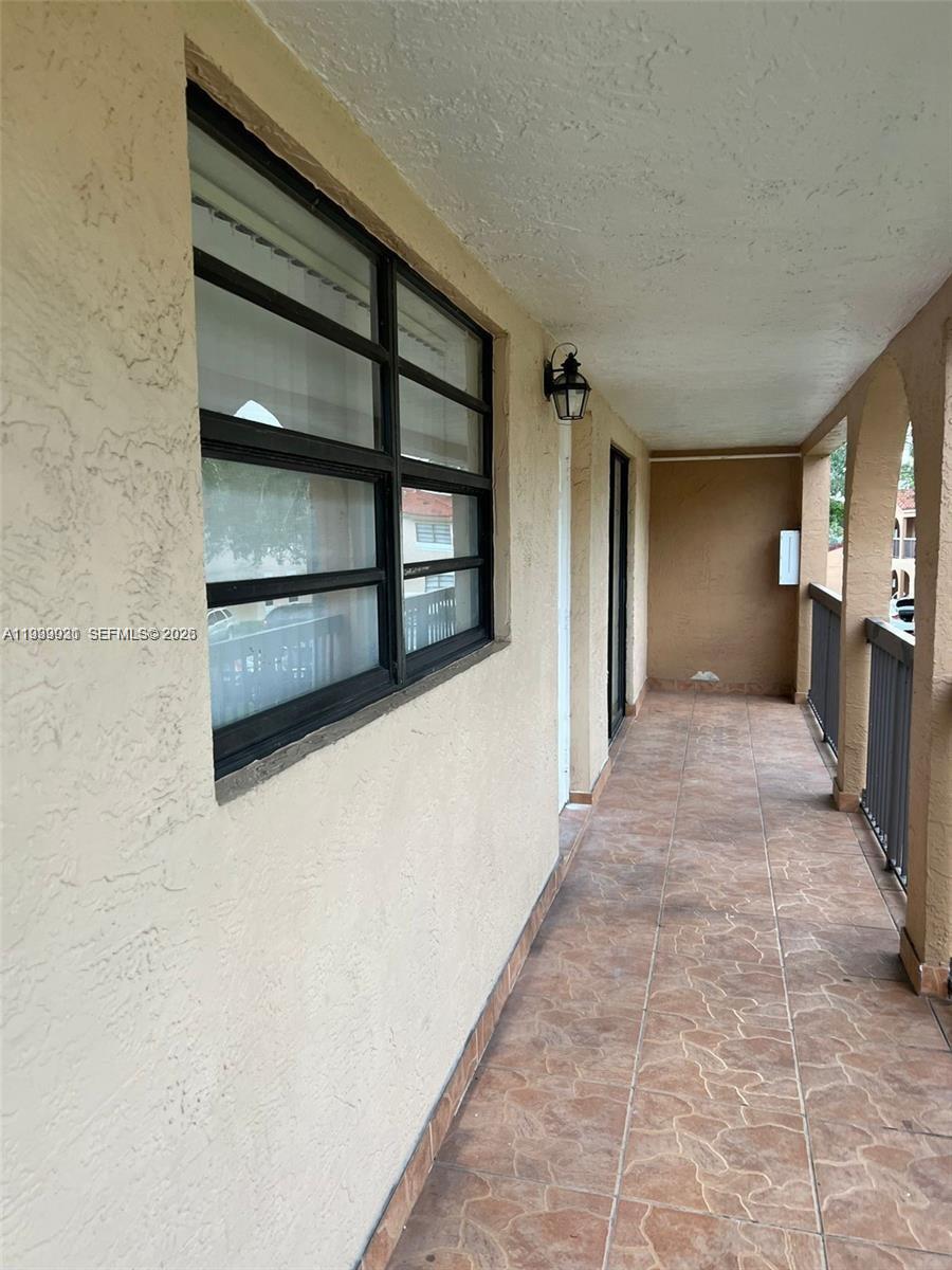 18210 Mediterranean Boulevard, Unit 620 Hialeah, FL 33015 - Photo 23 of 27 a view of entryway