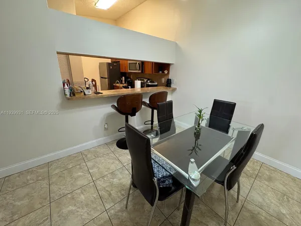 a view of a workspace with furniture