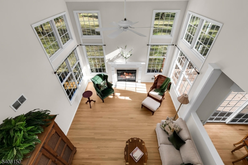 842 Madison Avenue Bridgewater, NJ 08807 - Photo 21 of 50 a living room with furniture and a fireplace