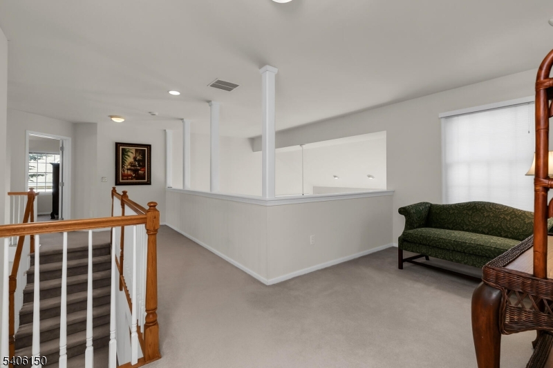 842 Madison Avenue Bridgewater, NJ 08807 - Photo 22 of 50 a living room with furniture and a window