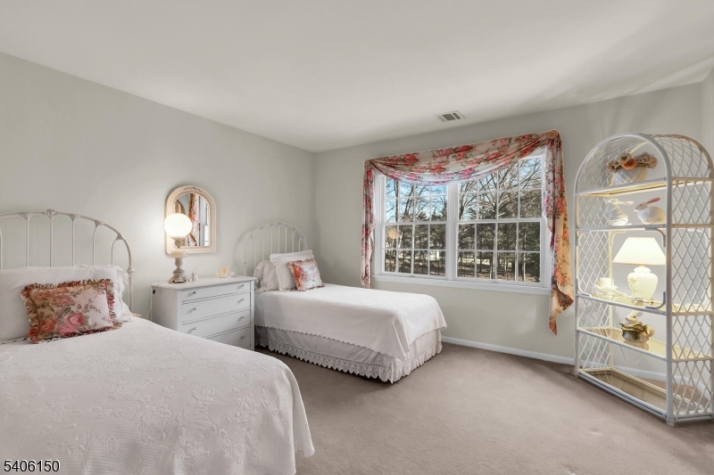 842 Madison Avenue Bridgewater, NJ 08807 - Photo 30 of 50 a bedroom with two beds and large window