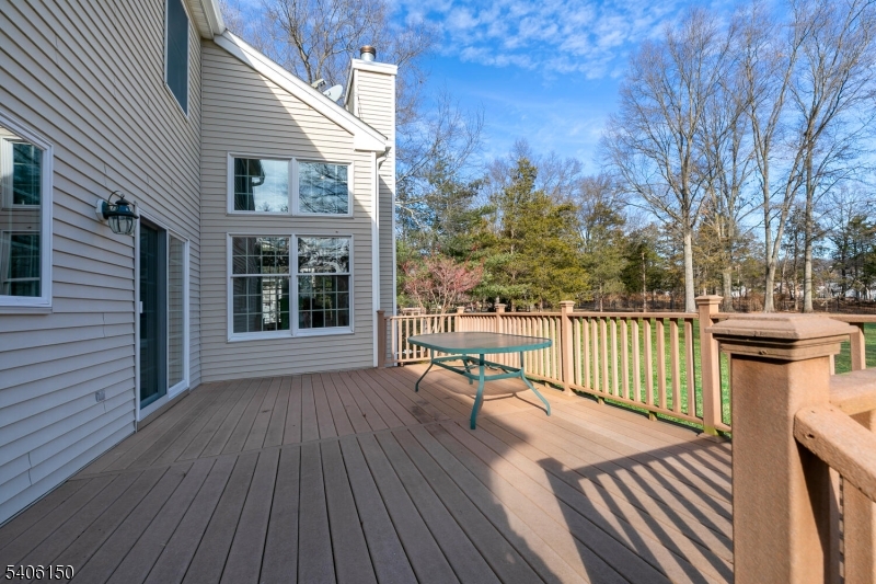 842 Madison Avenue Bridgewater, NJ 08807 - Photo 38 of 50 a view of a balcony with wooden floor and fence