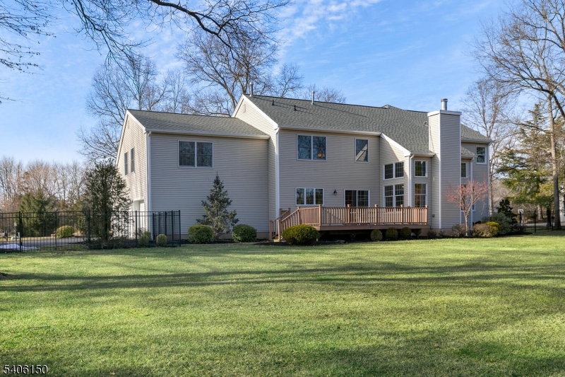842 Madison Avenue Bridgewater, NJ 08807 - Photo 42 of 50 a view of a house with a yard