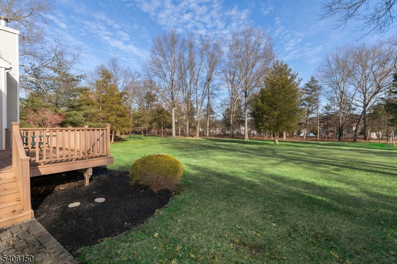 842 Madison Avenue Bridgewater, NJ 08807 - Photo 43 of 50 a view of a golf course with a house in the background