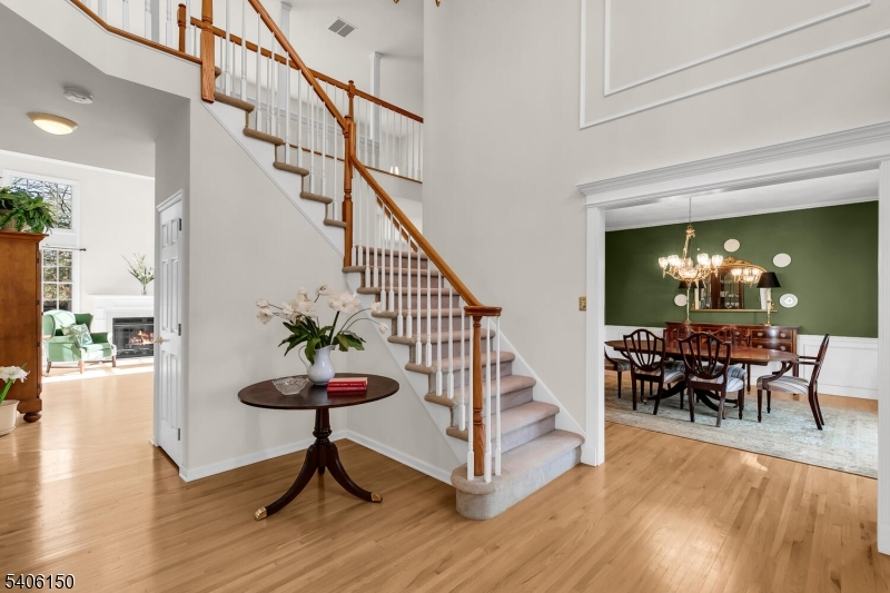 842 Madison Avenue Bridgewater, NJ 08807 - Photo 5 of 50 a view of a livingroom with furniture and wooden floor