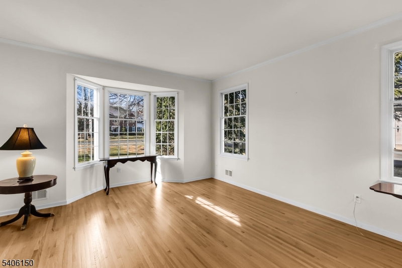 842 Madison Avenue Bridgewater, NJ 08807 - Photo 8 of 50 a view of a room with wooden floor and a window