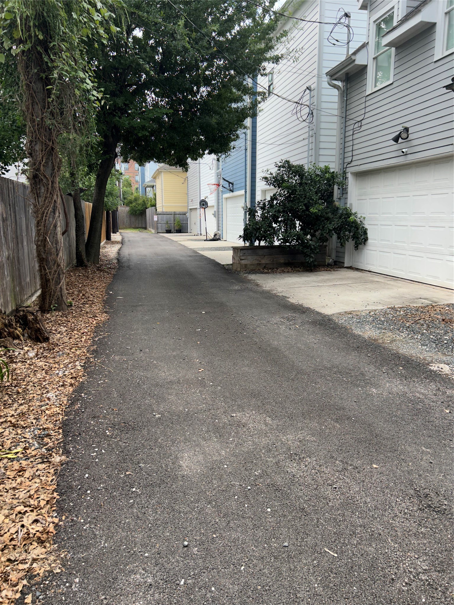 734 Allston Street, Unit B Houston, TX 77007 - Photo 26 of 28 The alley you access the garage is nicely paved.