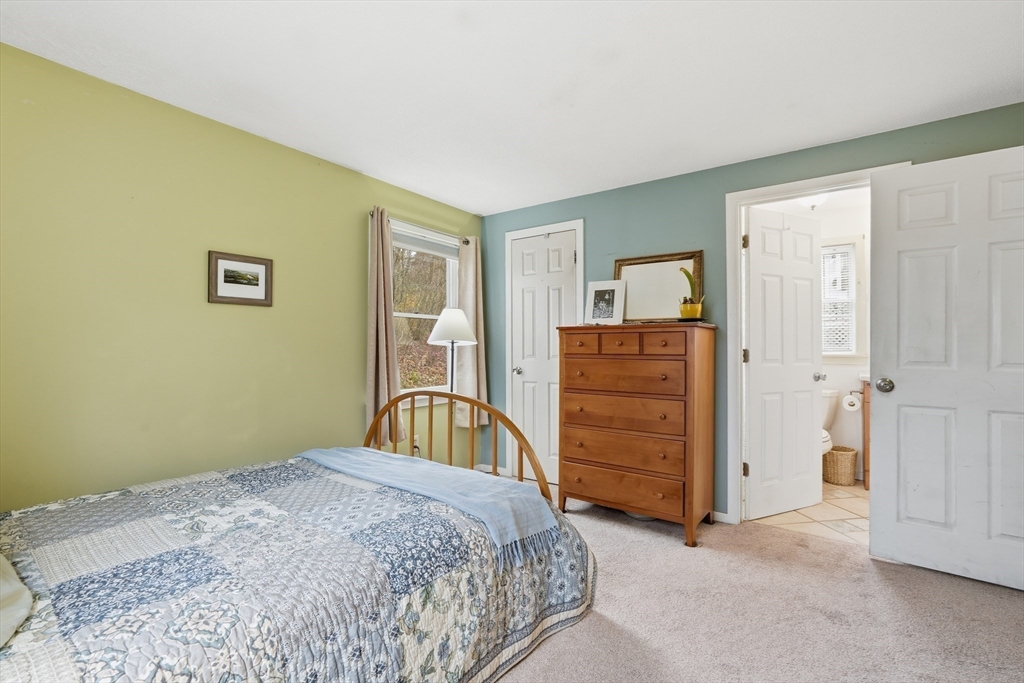 58 A Laurel Street, Unit 58A Greenfield, MA 01301 - Photo 17 of 35 a bedroom with a bed and closet