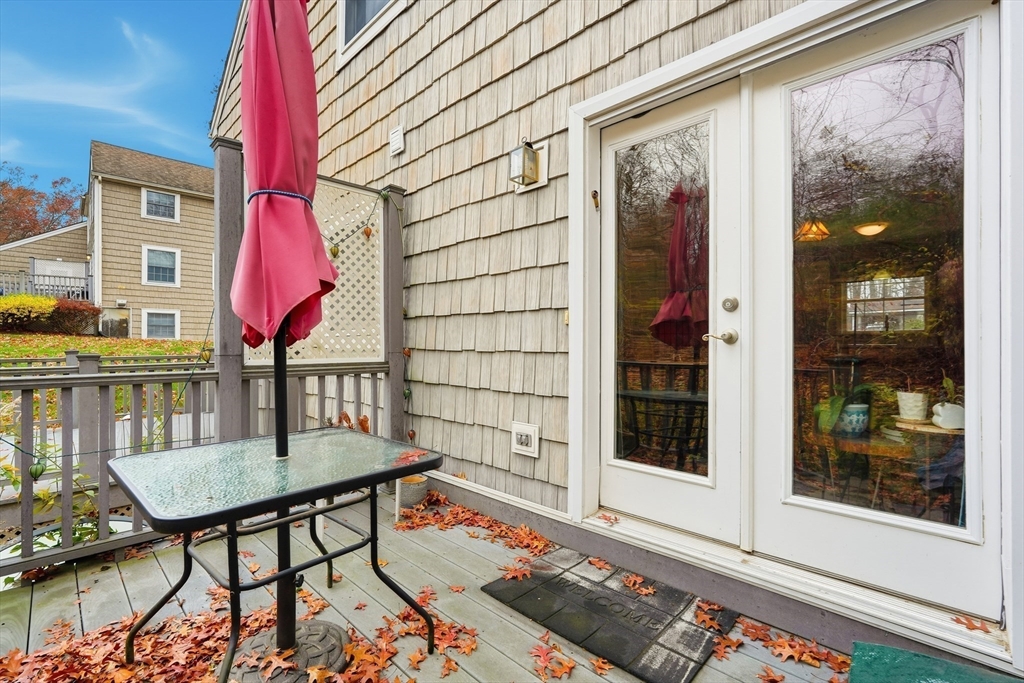 58 A Laurel Street, Unit 58A Greenfield, MA 01301 - Photo 26 of 35 a front view of a house with a porch