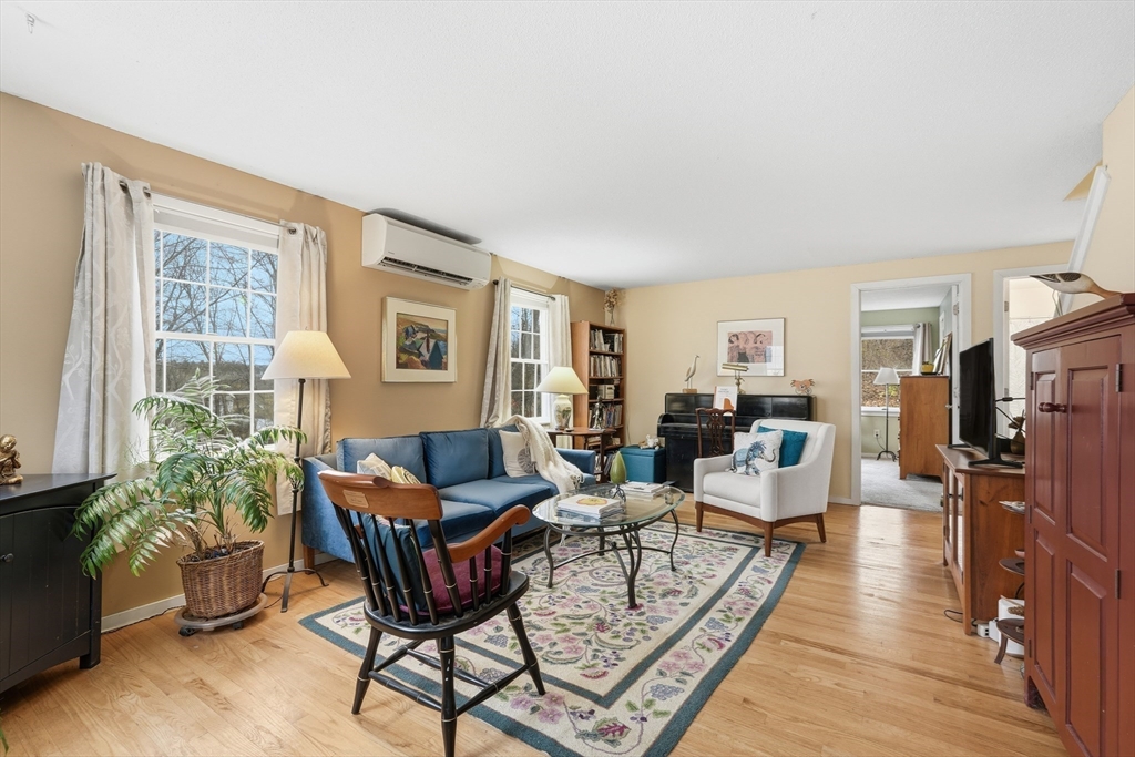 58 A Laurel Street, Unit 58A Greenfield, MA 01301 - Photo 5 of 35 a living room with furniture and a window