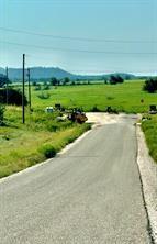 1081 Creek Crossing Road Nemo, TX 76070 - Photo 5 of 7 a view of a golf course with a big yard