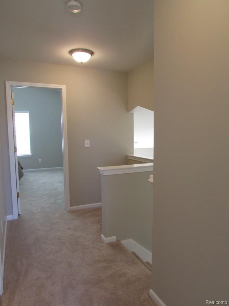 46 Eagle Ridge Road Lake Orion, MI 48360 - Photo 29 of 35 View of upstairs landing and hallway