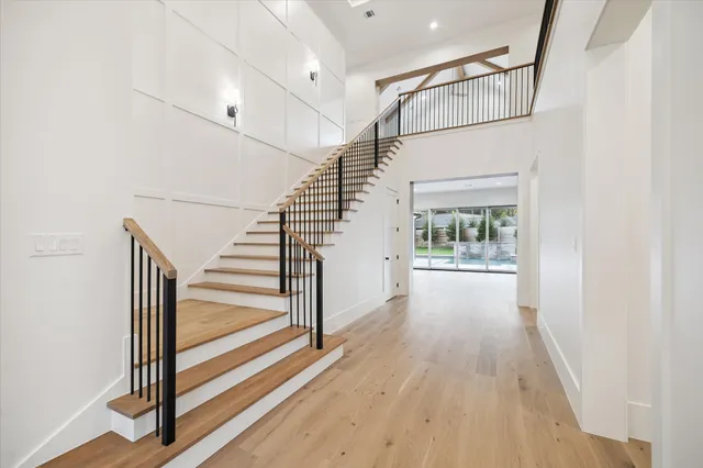a view of kitchen with furniture and windows