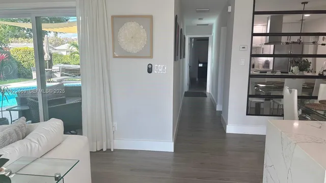 a view of livingroom with furniture and window