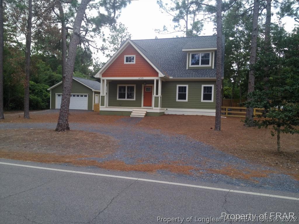 4015 Youngs Road Southern Pines, NC 28387 - Photo 1 of 25 front view of a house with a yard