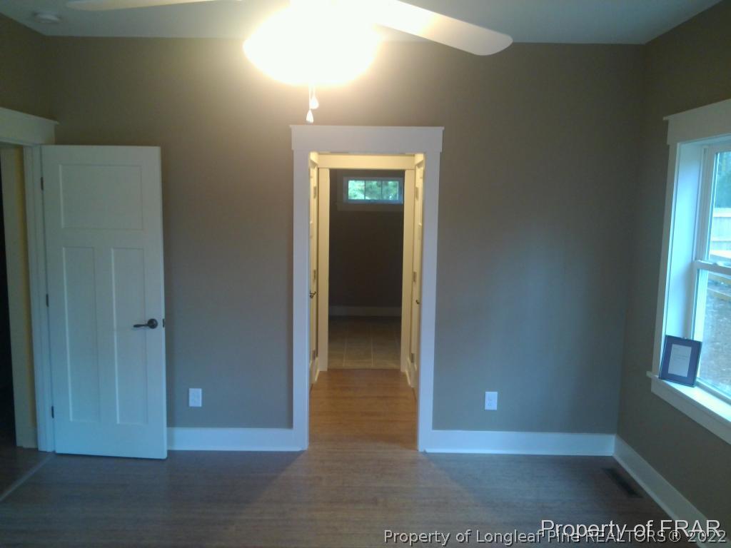 4015 Youngs Road Southern Pines, NC 28387 - Photo 13 of 25 an empty room with windows