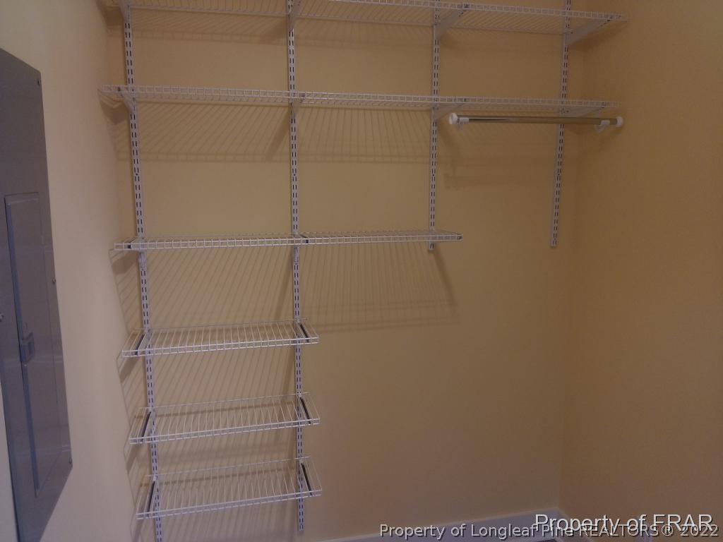 4015 Youngs Road Southern Pines, NC 28387 - Photo 19 of 25 a view of a room with racks on the wall