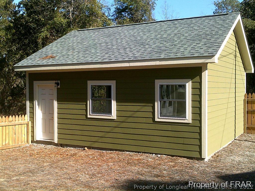4015 Youngs Road Southern Pines, NC 28387 - Photo 23 of 25 a front view of a house