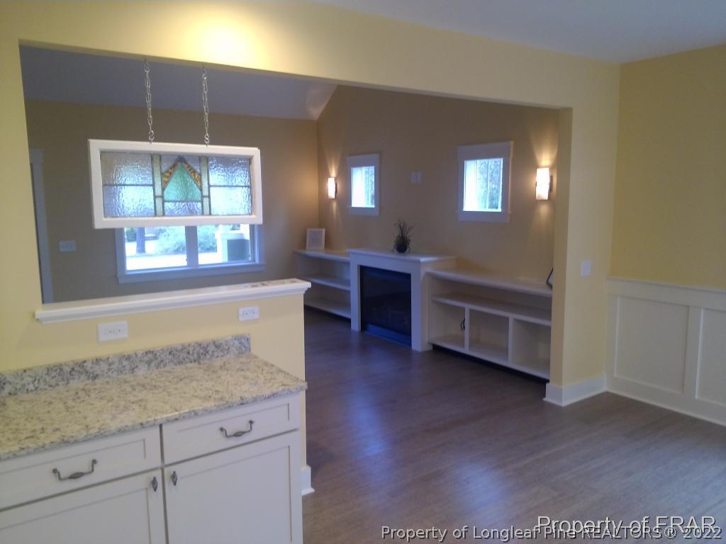 4015 Youngs Road Southern Pines, NC 28387 - Photo 6 of 25 a view of a livingroom with furniture window and wooden floor