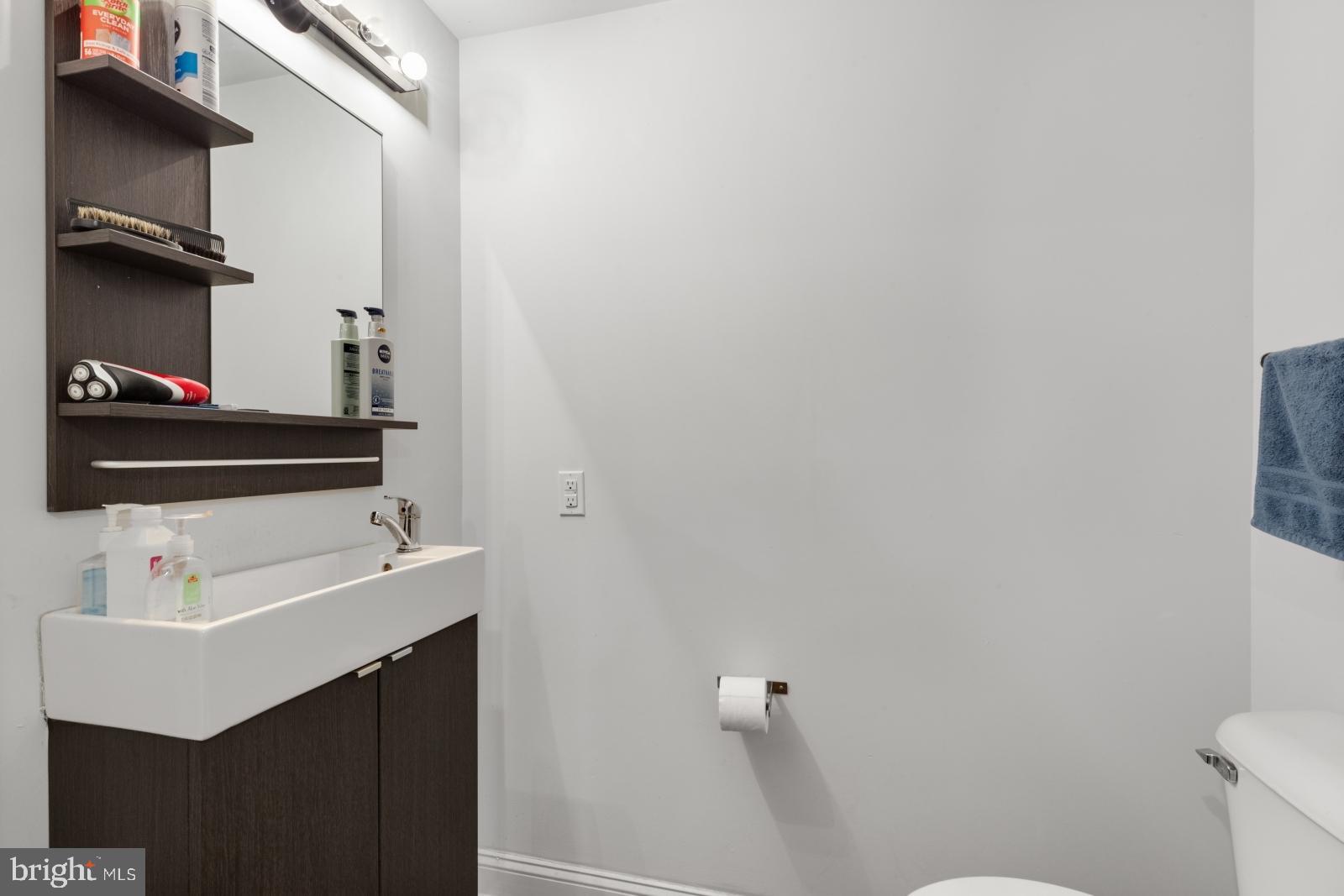 2629 Cedar Street Philadelphia, PA 19125 - Photo 11 of 30 a bathroom with a sink and a toilet