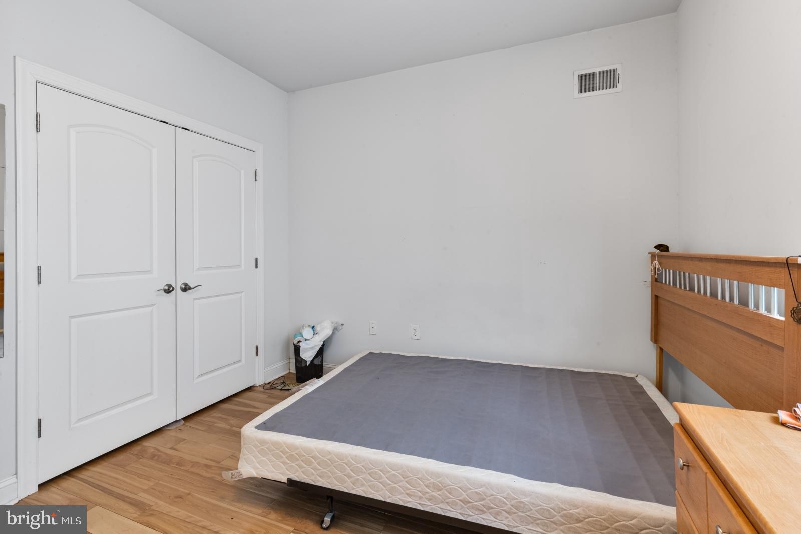 2629 Cedar Street Philadelphia, PA 19125 - Photo 17 of 30 a view of a room with wooden floor and cabinet