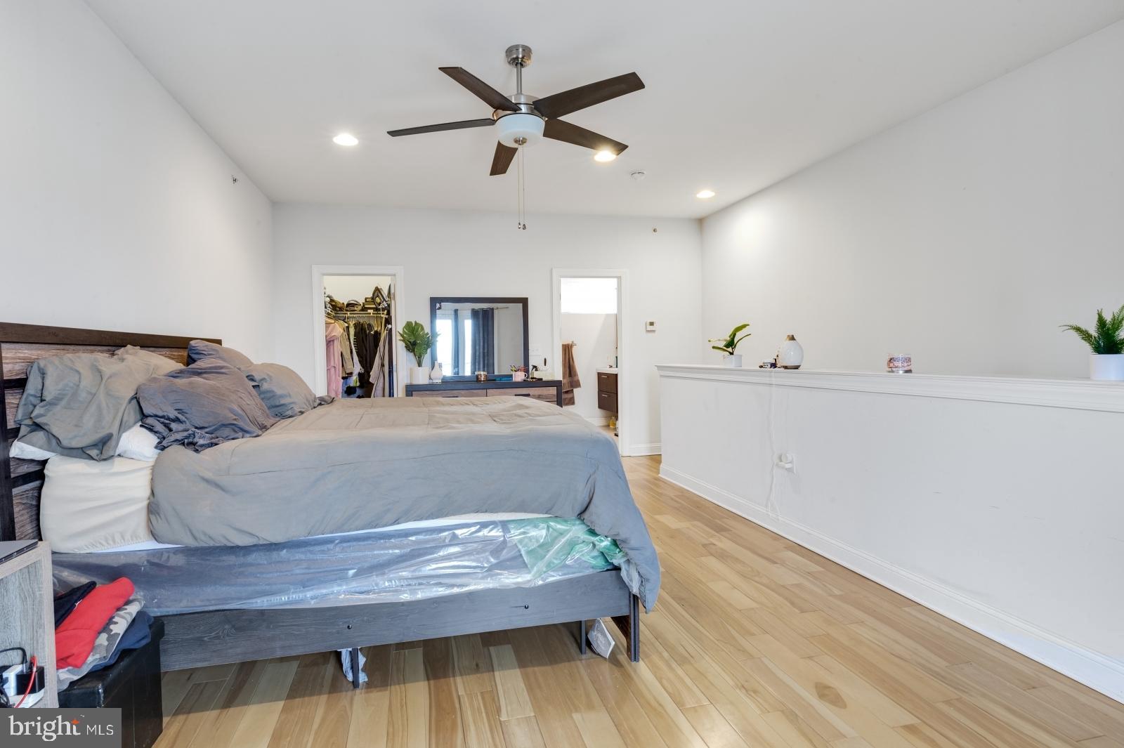 2629 Cedar Street Philadelphia, PA 19125 - Photo 25 of 30 a bed room with a bed and a ceiling fan