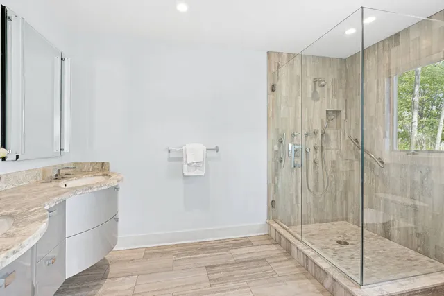 a view of front door of house and yard