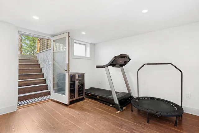 a utility room with sink dryer and washer