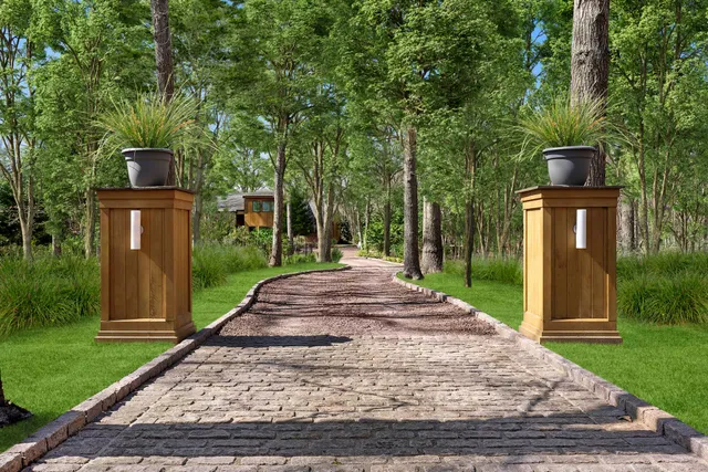 an aerial view of a house with outdoor space and street view