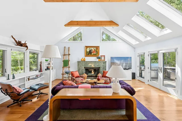 a large kitchen with stainless steel appliances granite countertop a stove a sink and a refrigerator