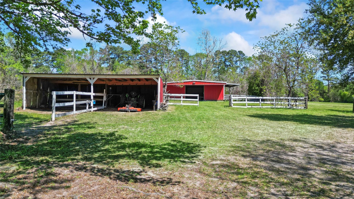 187 Watson Lake Road Huntsville, TX 77340 - Photo 5 of 25 a view of a house with a yard and sitting area