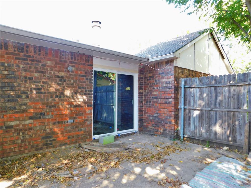 421 Shadowcrest Lane Coppell, TX 75019 - Photo 20 of 22 a view of a brick house with an outdoor space