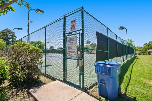 a street view with a building in the background