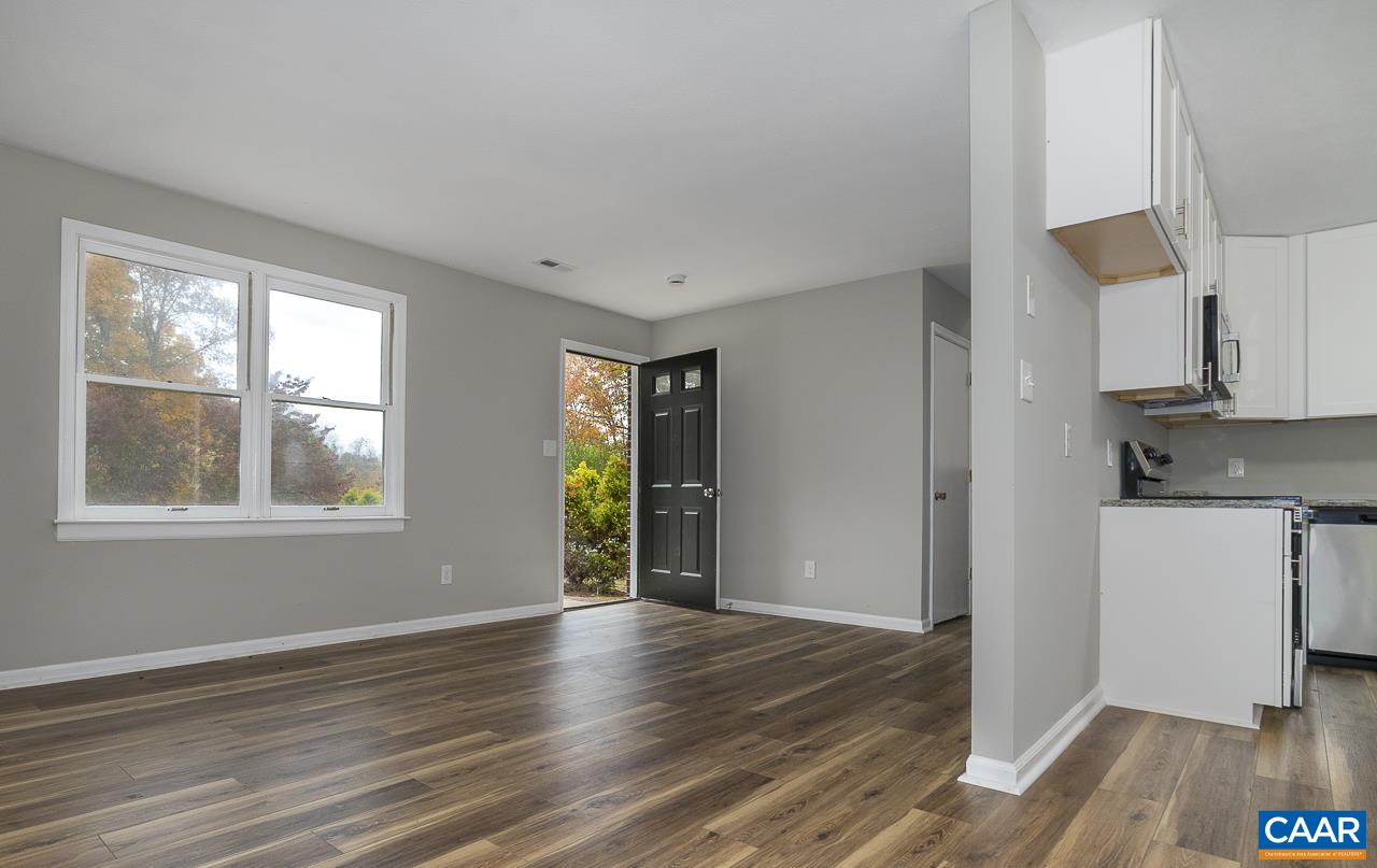 3660 Union Church Road Buckingham, VA 23921 - Photo 13 of 25 a view of an empty room with wooden floor and a window