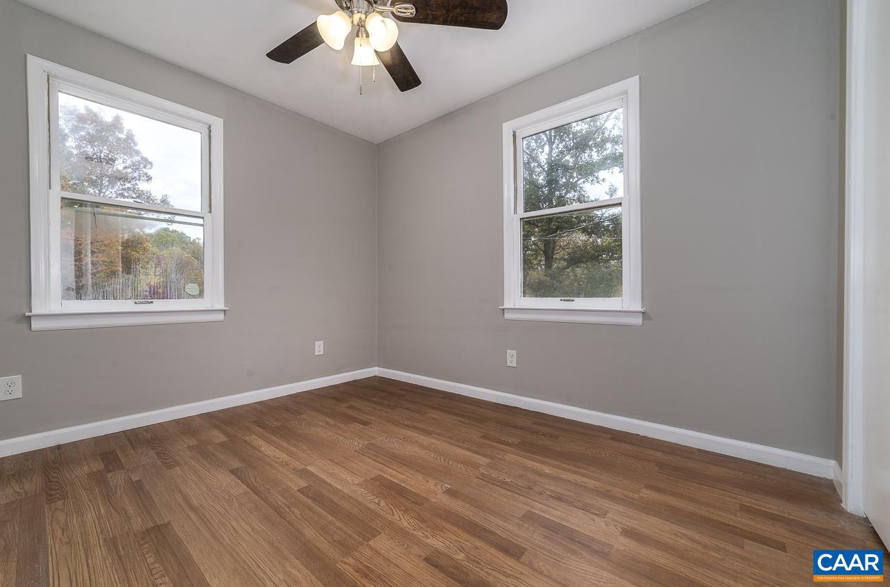 3660 Union Church Road Buckingham, VA 23921 - Photo 16 of 25 a view of an empty room with wooden floor and window