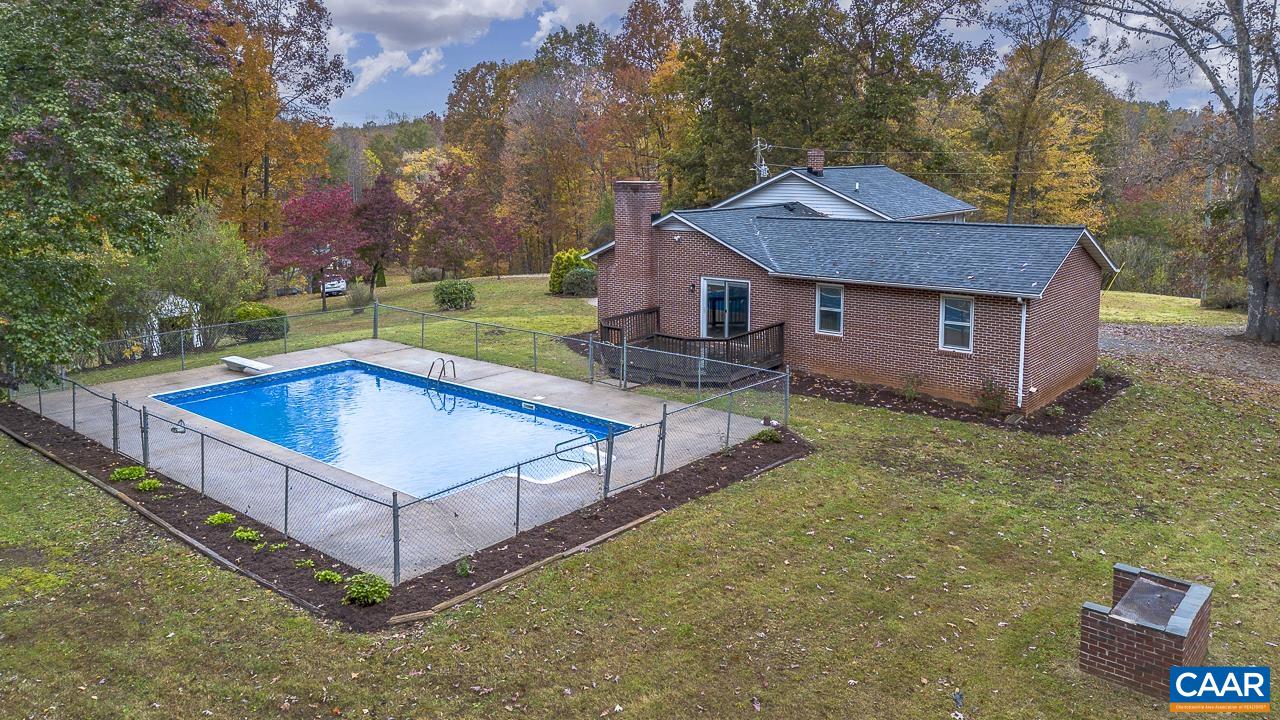3660 Union Church Road Buckingham, VA 23921 - Photo 4 of 25 a view of a house with a yard balcony and wooden fence