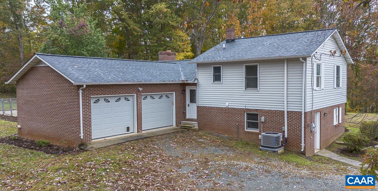 3660 Union Church Road Buckingham, VA 23921 - Photo 5 of 25 a view of a house with a yard and garage