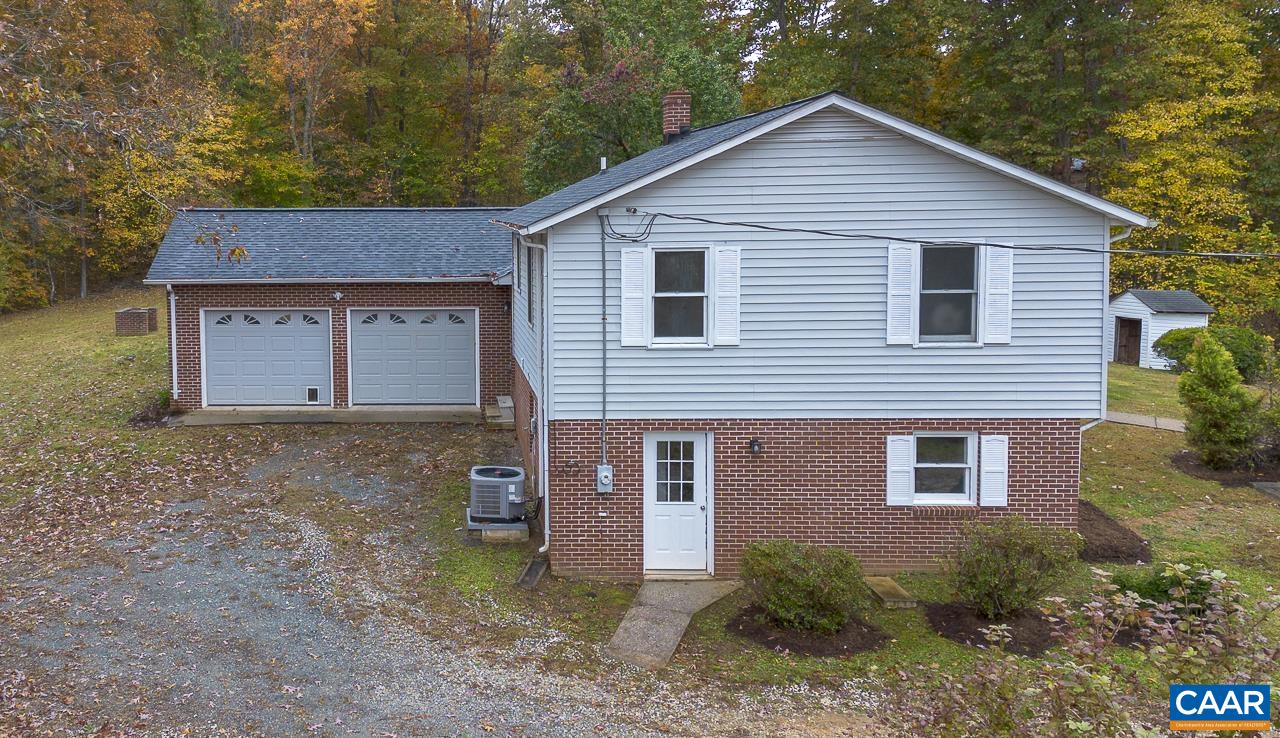 3660 Union Church Road Buckingham, VA 23921 - Photo 6 of 25 a view of a house with a yard and large tree