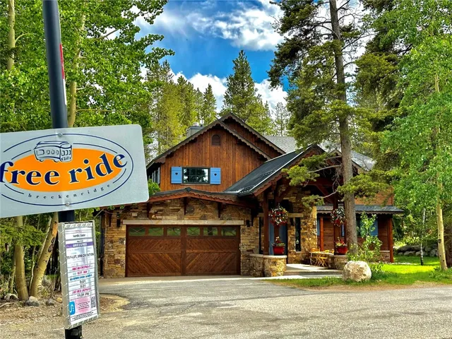 a front view of a house with entryway and stairs