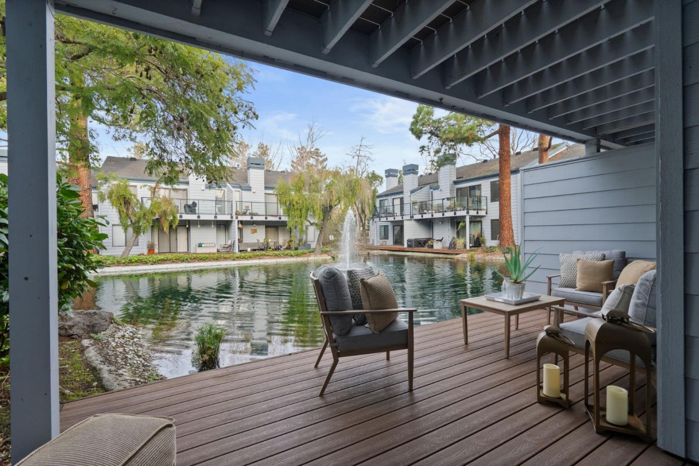 905 West Middlefield Road, Unit 923 Mountain View, CA 94043 - Photo 22 of 38 a view of a chairs and table on the wooden floor
