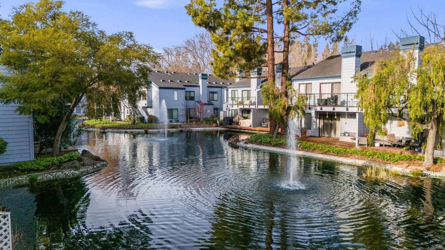 905 West Middlefield Road, Unit 923 Mountain View, CA 94043 - Photo 27 of 38 a view of a lake with houses