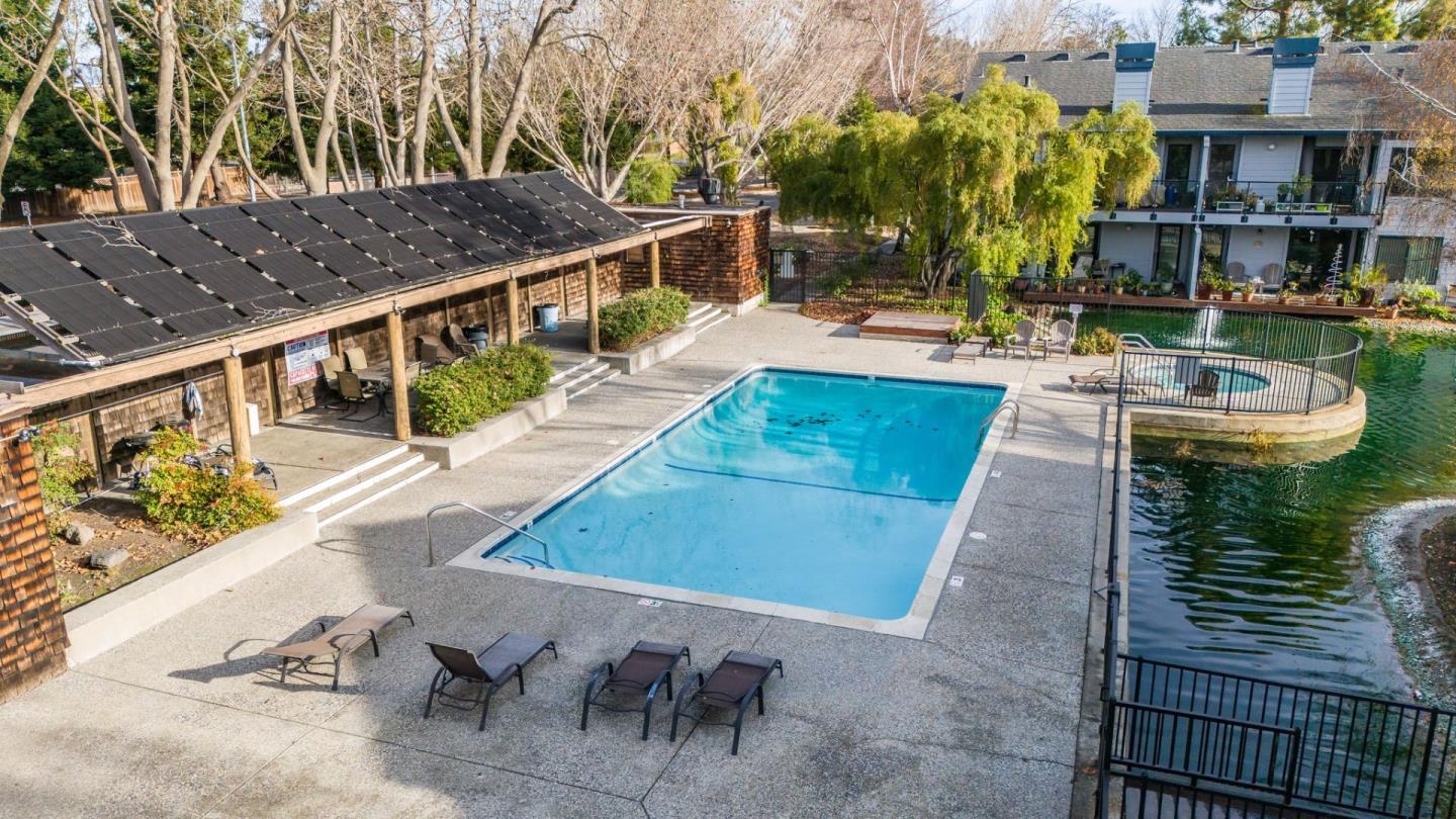 905 West Middlefield Road, Unit 923 Mountain View, CA 94043 - Photo 31 of 38 a terrace with outdoor seating and city view