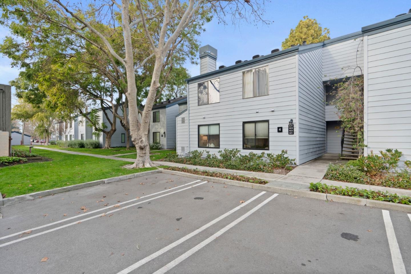 905 West Middlefield Road, Unit 923 Mountain View, CA 94043 - Photo 33 of 38 front view of a house with a yard