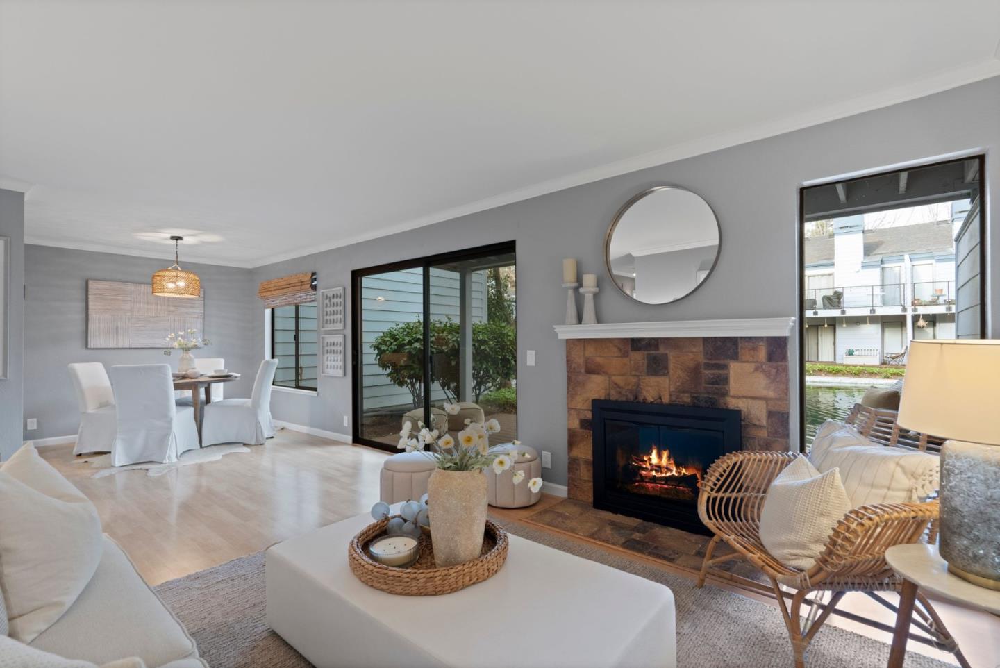905 West Middlefield Road, Unit 923 Mountain View, CA 94043 - Photo 6 of 38 a living room with furniture a fireplace and window