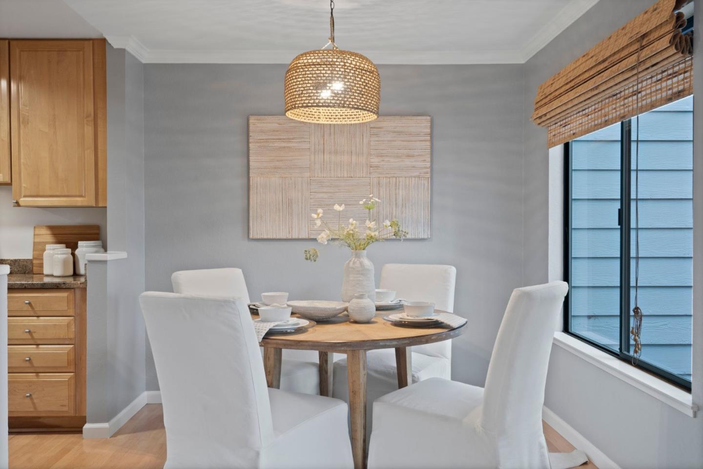 905 West Middlefield Road, Unit 923 Mountain View, CA 94043 - Photo 8 of 38 a dining room with furniture and window