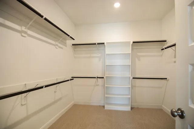 a view of an empty walk in closet