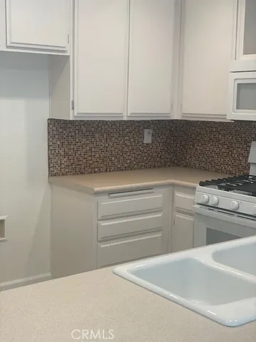 front view of a house with a garden